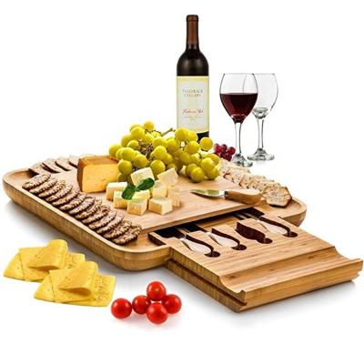 China Small Disposable Natural Cutting Board With Single Drawer Bamboo Cheese Board Set for sale