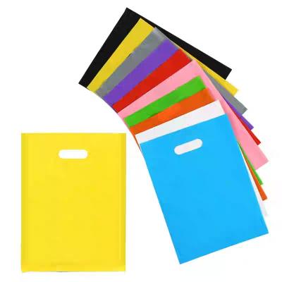 China Handled Stock Biodegradable Nonwoven Shopping Bags Die Cut Handle With Custom Logo for sale