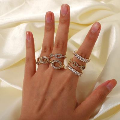 China Chunky Thick Hiphop Twist Stainless Steel Gold Plated Wedding Engagement Band Gemstone O Shaped Crystal Ring For Women for sale