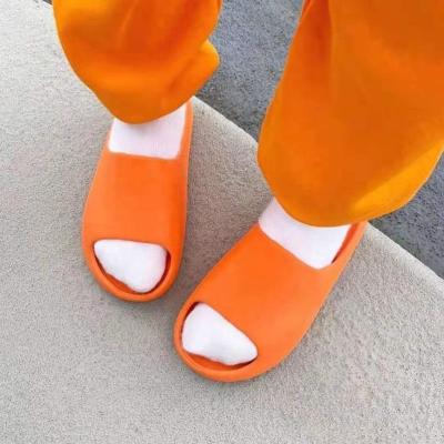 China CUSHIONING Original High Quality Unisex Foam Yeezy Slides Sandals Elmo Baby Yeezy Slides Bone Kids Slippers for sale