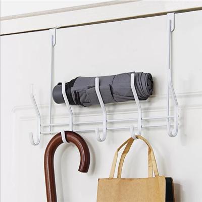 China Viable Wholesale Single Iron Over Door Hook Rack Home Hanging Free Nail Clothes Coat Hook Detachable Clothes Rack Black White for sale