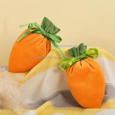 China New Eco-friendly Easter Party Bunny Rabbit Ornaments Reusable Carrot Candy Pouch Velvet Gift Bags for sale