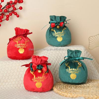 China Eco-friendly Wholesale Christmas Eve Candy Flannel Pocket Ribbon Velvet Bag Drawstring Gift Bags for sale