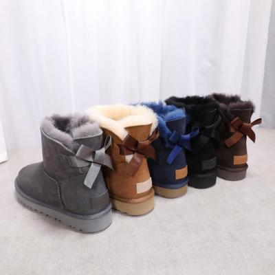 China Warm Snow Bootie, New Design Sheepskin Memory Sponge Anti-odor Winter Sale Unique Ladies Rubber Boots For Women for sale