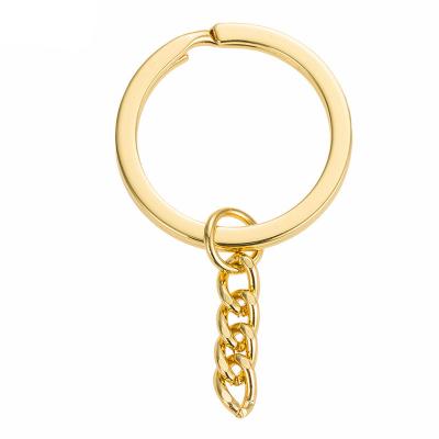 China Eco - Friendly 25mm Custom Slot Ring Gold Key Rings With Flat Chain for sale