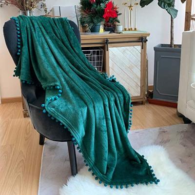 China Cozy Ball Throw Microfiber Anti-pilling Flannel Blanket Luxury Tassel Blanket With Pompom Tassel for sale