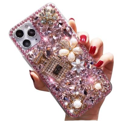 China Luxury Anti-fall Rhinestone Phone Case For i Pro Phone 12 Diamond Case Max Bling Premium Girly Style Perfume Bottle for sale