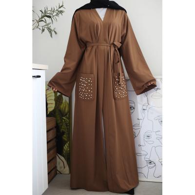 China Female Muslim Abaya Fashion Modern Over Islamic Clothing With Bead Pocket Robe 1738 for sale