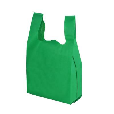 China Polypropylene Supermarket T-shirt Bag Eco-friendly Wholesale Hot Shopping W Cut Non Woven Vest Bag for sale