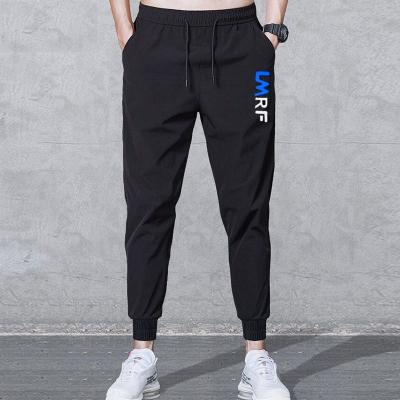 China Spring and autumn new spring and autumn code stretch men's casual pants viable loose sweatpants plus pants big little foot bound pants for sale