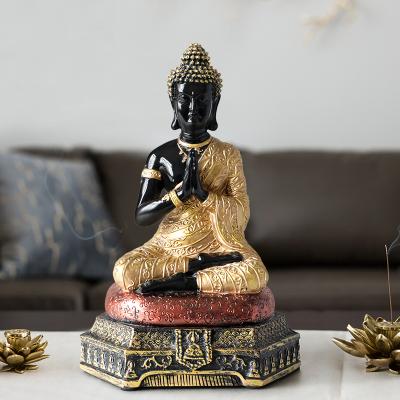 China China wholesale resin crafts resting cassock black gold buddha figurines sculpture green gold buddha statues for sale for sale