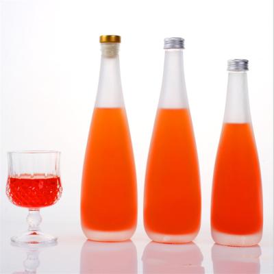 China Gift 300ml 500ml screw cover favored by customers glass drinking water bottles for Mezcal or tequila for sale