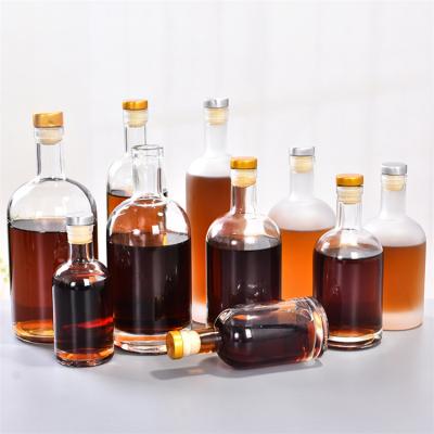 China Beverage Sealing glass large quantity premium 100 ml alcohol wine liquor vodka glass bottle for sale