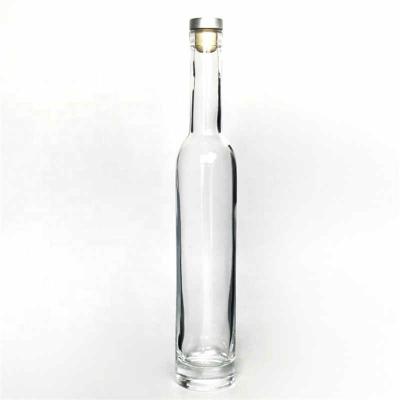 China Luxury Round Empty Beverage 500ml 700ml 1000ml Custom Logo With Cap Liquor Wine Whiskey Vodka Vodka Tequila Glass Bottle for sale