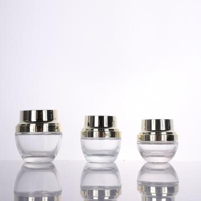 China Personal Care Wholesale 10ml 50ml 100ml Glass Cream Bottle Cosmetic Lotion Bottle for sale