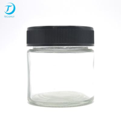 China High quality child safe container 3oz 2oz 60ml child safe glass jar with pp plastic lid for sale