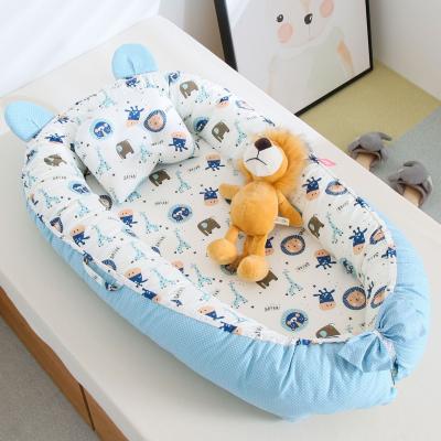 China Aoyatex Modern 100% Cotton Baby Nest Bed with Pillow Craddle Hutch Sleep Cotton Baby Sofa Portable Nest for sale