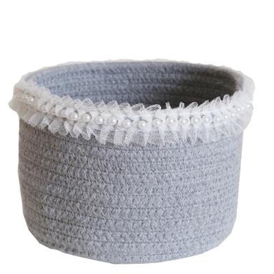 China Sustainable Cylindrical Simple Fashion Gray Cotton Rope Storage Basket With Lace for sale