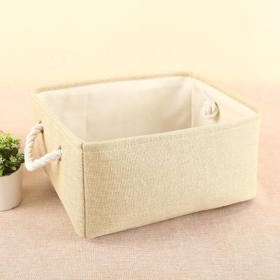 China Gold Viable Home Decorations Christmas Cloth Cube Tissue Storage Box Folding Canvas Basket for sale