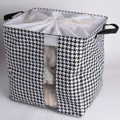 China Amazon Big Black And White Folding Dustproof Hot Sale Storage Bag For Space Saving for sale