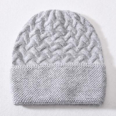 China COMMON outdoor wool knitted women winter high quality hats luxury plain knit skull caps for women 2021 for sale