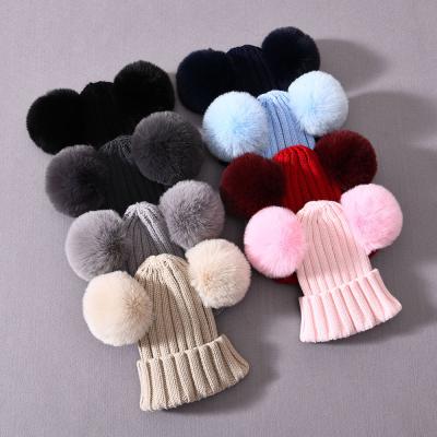 China COMMON Hign Quality Winter Beanie Hat Kids Soft Material Wholesale Pompom for Boy and Girl for sale