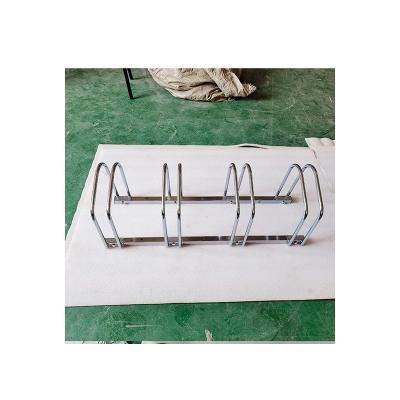 China Durable High Quality Outdoor Floor Metal Galvanized 4 Slots Standing Rack Bike Storage Rack for sale