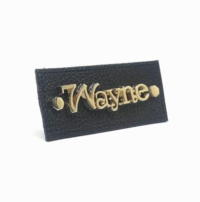 China Durable Leather Jeans Apparel Labels Manufacturer Custom Logo Embossed Metal Real Genuine Patches For Hats for sale