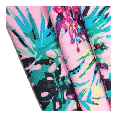 China Stretch Sports Swimming Swimwear Custom Spandex 4 Way Stretch Nylon Print Fabric for sale