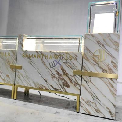 China Luxury Gold Jewelery Shop Showroom Retail Shop Display Showcase Jewelry Shop Counter Marble Glass Design 5 Years Quality Warranty for sale