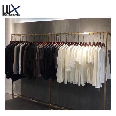 China Clothing Retail Store Iron Display Rack Design Eco - Friendly Clothing Store Furniture For Hanging Clothes for sale