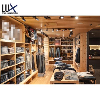 China Eco-friendly Modern Clothing Store Window Display Clothing Store Fitting Room Interior Design for sale