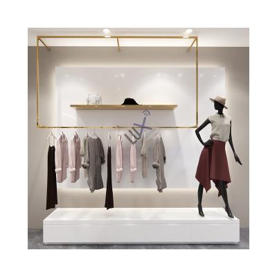 China LUX Design Factory Custom Ladies Clothes Store Display Rack With Gold Display Wall Mount Stand 5 Years Quality Warranty for sale