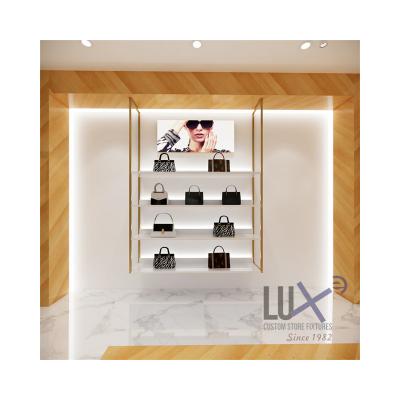 China LUX Custom Fashion Gold Wall Mounted Lady Luxury Handbag Shop To Show Furniture For Shops Bag Metal Display Bags Shelf 5 Years Quality Warranty for sale