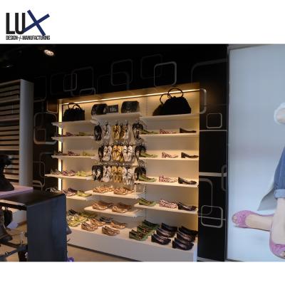 China Eco - Friendly Design Professional Fashion Shoe Store Display Rack For Display Furniture for sale