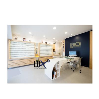 China Custom LUX Optical Showroom Furniture Bespoke Wooden Optical Rack Display MDF Counter 5 Years Quality Warranty for sale