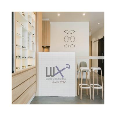 China LUX Latest Fashion Fancy Wooden MDF Eyewear Display Showcase Eyewear Wall Mounted Eyewear Cabinet 5 Years Quality Warranty for sale