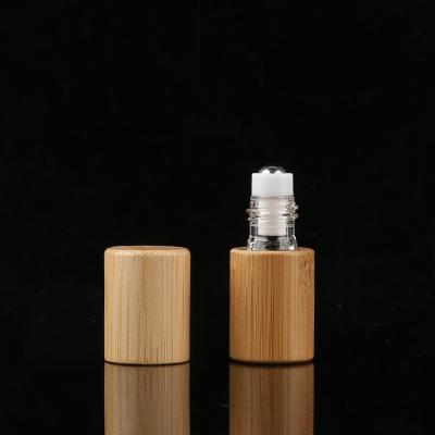 China Bamboo Cover Glass Empty Roll On Bottle for sale