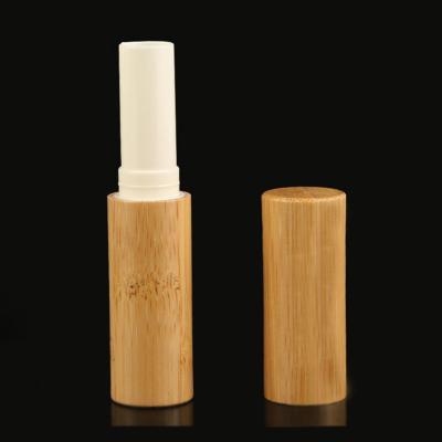 China Economical 4.5g bamboo color plastic PP wooden cover round OEM lipstick tube cosmetic packaging for sale