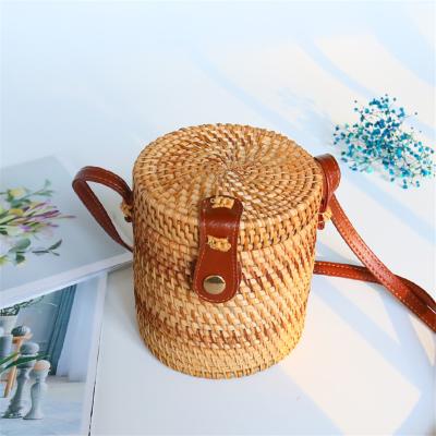 China Natural Boho Chic Round Bucket Purse Bamboo Straw Beach Summer Bag Handmade Rattan Plant Rattan Bag for sale