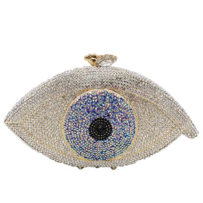 China Diamond Lady New Design Good Quality Sparkle Metal Evening Purse Rhinestone Handbag Evil Eye Shape Woman Clutch Bags for sale