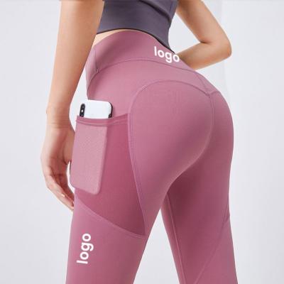 China Wholesale Breathable Abdomen Woman Fitness Gym Push Up Butt Lift Waist Yoga Gaiters Pants With Reticulated Mesh Pockets for sale