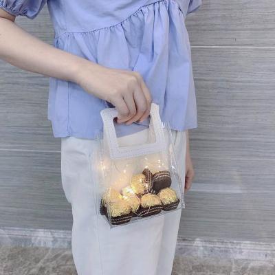 China Reusable Plastic Clear Gifts Shock Resistance PVC Button Bag Shopping Wrapped Tote Bag for sale