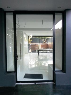 China Modern Aluminium Pivot Doors Powder Coated Double Glazed Size Customized for sale