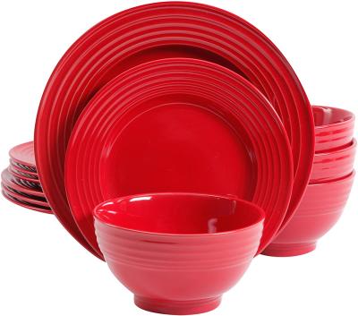 China Viable 18 Pieces Embossed Red Color Glaze Bone China Porcelain Cup Tableware Porcelain Dinner Set Ceramic Dinnerware Sets for sale