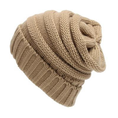 China COMMON Fashion And High Warm Acrylic Winter Knitted Hat Roll Hats For Women for sale