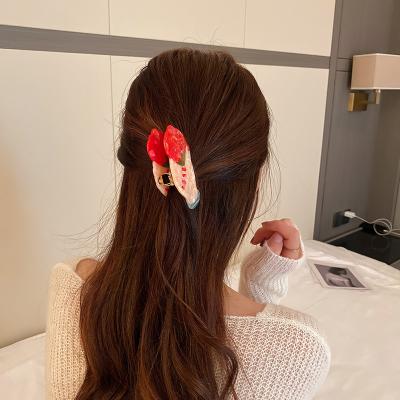 China New Arrival Unique Red Rose Hold By Hand Shape Acrylic Hair Accessories Women Friendly Material Claw Hair Clips for sale