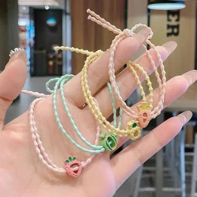 China Cute Environmentally Friendly Hair Accessories Hollow Fruit Elastic Band Pineapple And Strawberry Elastic Hair Band For Kids for sale