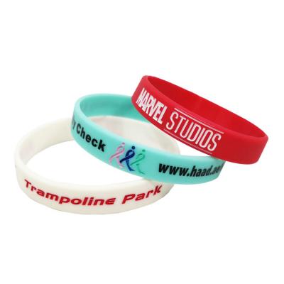 China Custom Silicone Wristband Debossed Logo CLASSIC and completed color wristband for sale