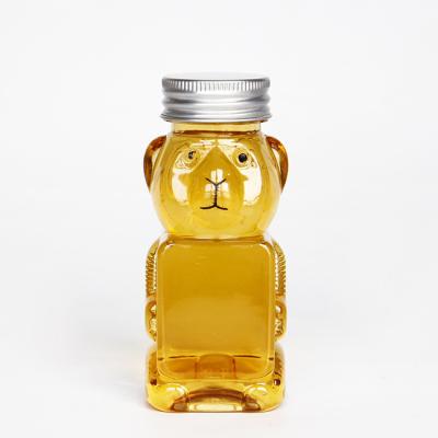 China food & Drink Packaging Wholesale Cheap Teddy Bear Shaped Honey Bee Bottle 240ml Candy Sugar Chocolate Plastic Jar With Hook Lid 8oz for sale